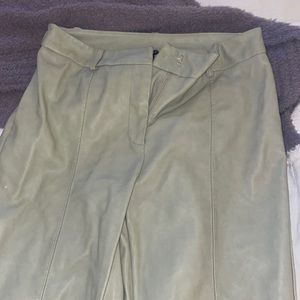 Green leather flare pants